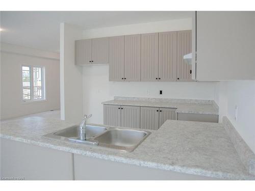 19 Huntsworth Avenue, Thorold, ON - Indoor Photo Showing Kitchen With Double Sink