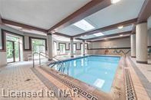 306-8111 Forest Glen Drive, Niagara Falls, ON - Indoor Photo Showing Other Room With In Ground Pool