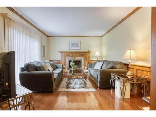 37 Cole Farm Boulevard, St. Catharines, ON - Indoor Photo Showing Living Room With Fireplace