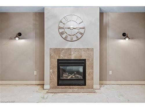 1-7 Gibson Place, St. Catharines, ON - Indoor Photo Showing Living Room With Fireplace