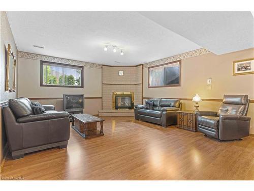 7737 Mount Carmel Boulevard, Niagara Falls, ON - Indoor Photo Showing Living Room With Fireplace