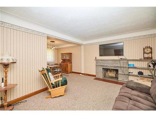 6357 Dorchester Road, Niagara Falls, ON - Indoor With Fireplace