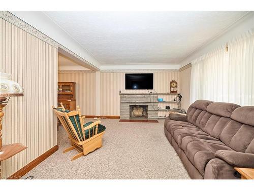 6357 Dorchester Road, Niagara Falls, ON - Indoor Photo Showing Living Room With Fireplace