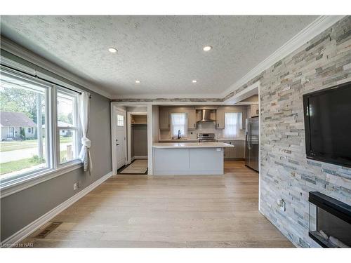 6259 Atlee Street, Niagara Falls, ON - Indoor Photo Showing Kitchen With Fireplace