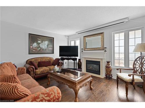 26 Wright Crescent, Niagara-On-The-Lake, ON - Indoor Photo Showing Living Room With Fireplace