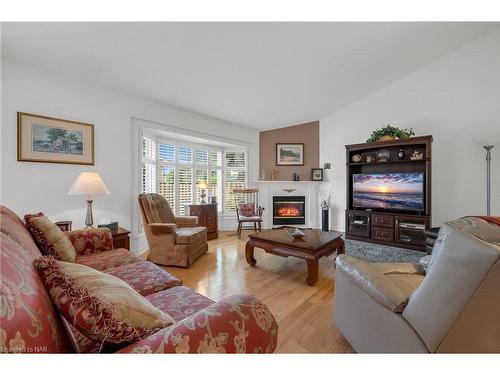 12-3516 Main Street, Niagara Falls, ON - Indoor Photo Showing Living Room With Fireplace