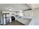 3-402 Fares Street, Port Colborne, ON  - Indoor Photo Showing Kitchen With Double Sink 