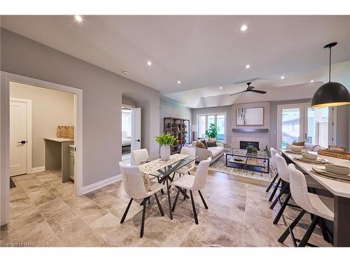 464 Old Course Trail, Welland, ON - Indoor Photo Showing Dining Room With Fireplace