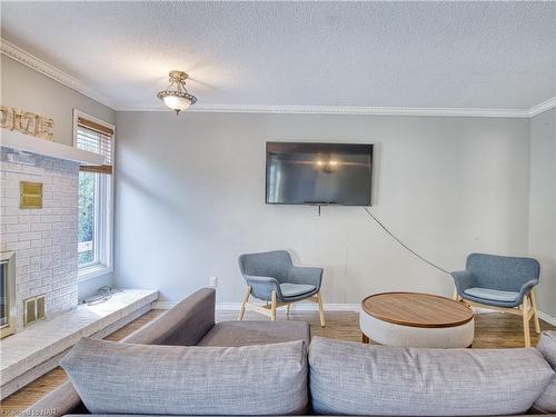 33 The Meadows Street, St. Catharines, ON - Indoor Photo Showing Living Room With Fireplace