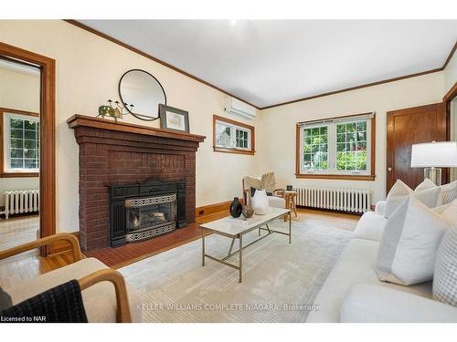 3855 St James Avenue, Niagara Falls, ON - Indoor Photo Showing Living Room With Fireplace