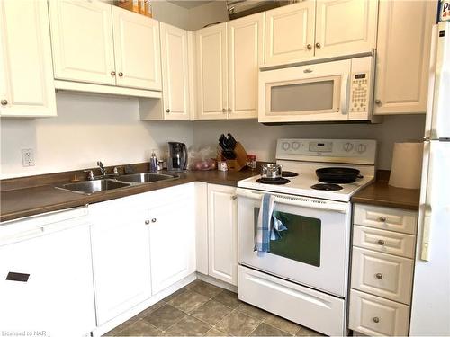 11 Duke Street, St. Catharines, ON - Indoor Photo Showing Kitchen With Double Sink