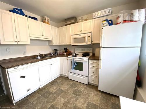 11 Duke Street, St. Catharines, ON - Indoor Photo Showing Kitchen With Double Sink