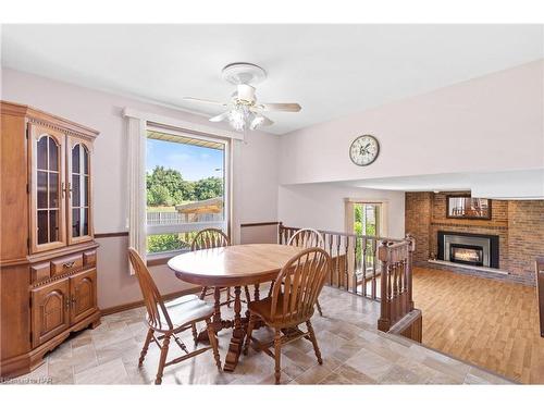 58 Wiltshire Boulevard, Welland, ON - Indoor Photo Showing Dining Room With Fireplace