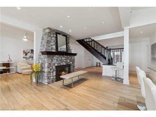 899 Edgemere Road, Fort Erie, ON - Indoor Photo Showing Living Room With Fireplace