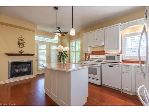 9-450 Nassau Street, Niagara-On-The-Lake, ON - Indoor Photo Showing Kitchen With Fireplace