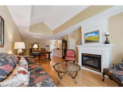 18-1439 Niagara Stone Road, Niagara-On-The-Lake, ON - Indoor Photo Showing Living Room With Fireplace