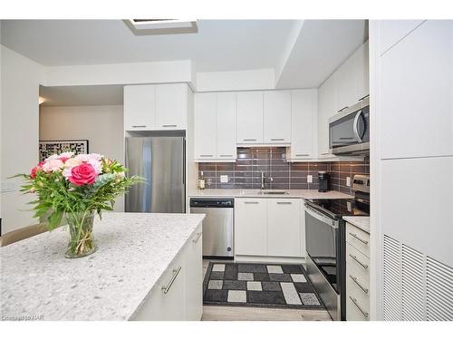 1611-385 Winston Road, Grimsby, ON - Indoor Photo Showing Kitchen With Stainless Steel Kitchen With Double Sink With Upgraded Kitchen