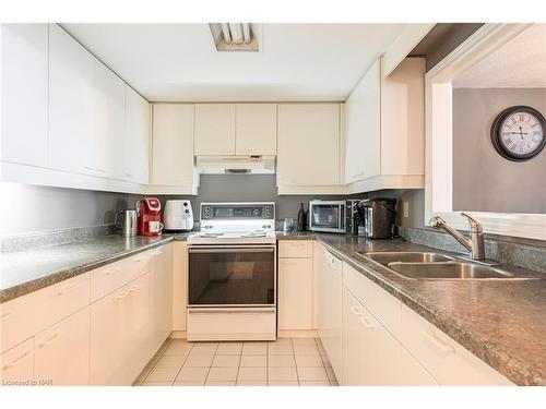 2502-701 Geneva Street, St. Catharines, ON - Indoor Photo Showing Kitchen With Double Sink