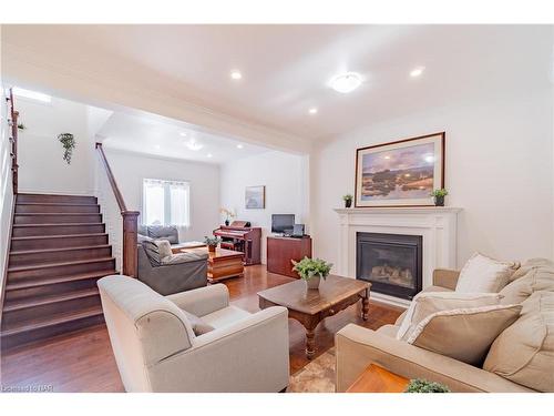 6571 Cleveland Avenue, Niagara Falls, ON - Indoor Photo Showing Living Room With Fireplace