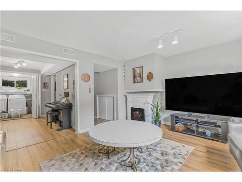 18 Endicott Terrace, Welland, ON - Indoor Photo Showing Living Room With Fireplace