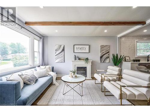 31 Warren Road, St. Catharines, ON - Indoor Photo Showing Living Room With Fireplace