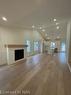 65 Windsor Avenue, Fort Erie, ON  - Indoor With Fireplace 