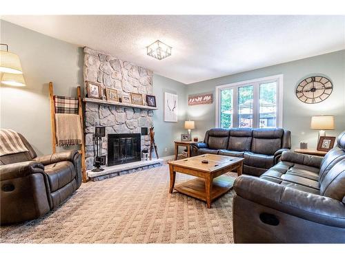 9 Hilda Street, Welland, ON - Indoor Photo Showing Living Room With Fireplace