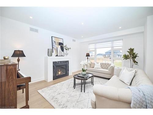 7434 Sherrilee Crescent Crescent, Niagara Falls, ON - Indoor Photo Showing Living Room With Fireplace