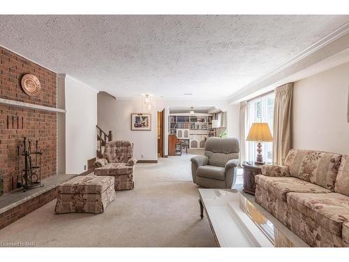 19 Via Dell Monte, St. Catharines, ON - Indoor Photo Showing Living Room With Fireplace