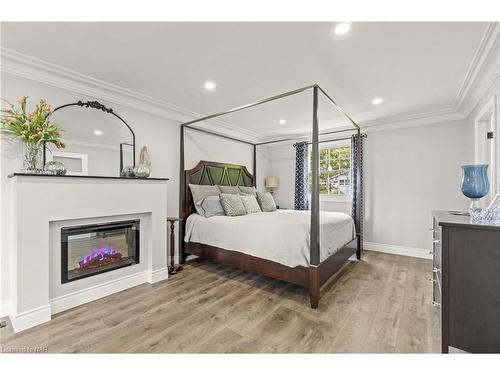 5 Loyalist Court, Niagara-On-The-Lake, ON - Indoor Photo Showing Bedroom With Fireplace