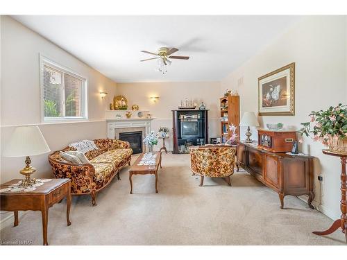 8052 Beaverton Boulevard, Niagara Falls, ON - Indoor Photo Showing Living Room With Fireplace