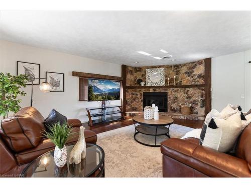 1042 Lakeshore Road W, St. Catharines, ON - Indoor Photo Showing Living Room With Fireplace