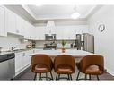 132-8111 Forest Glen Drive, Niagara Falls, ON  - Indoor Photo Showing Kitchen With Double Sink With Upgraded Kitchen 