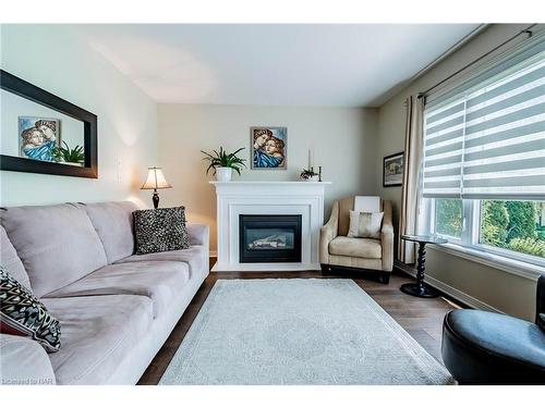 13 Mccaffery Crescent, St. Catharines, ON - Indoor Photo Showing Living Room With Fireplace