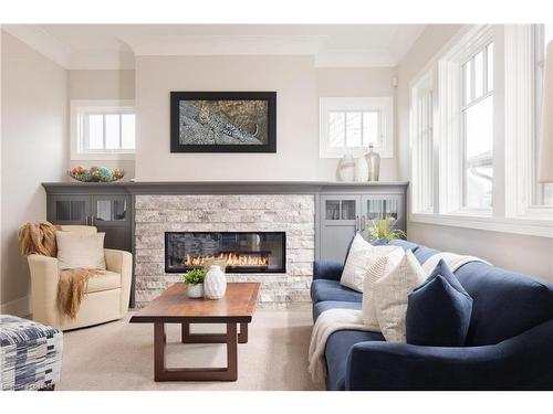 32 Breckenridge Boulevard, St. Catharines, ON - Indoor Photo Showing Living Room With Fireplace