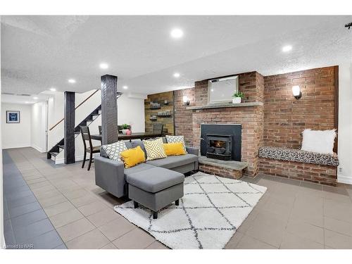 8039 Aintree Drive, Niagara Falls, ON - Indoor Photo Showing Living Room With Fireplace