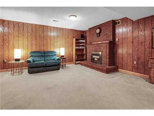 16 Dobbie Road, Thorold, ON - Indoor Photo Showing Living Room With Fireplace