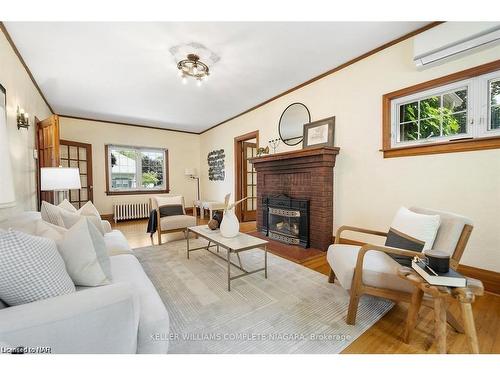 3855 St James Avenue, Niagara Falls, ON - Indoor Photo Showing Living Room With Fireplace