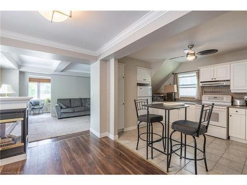23 Hainer Street, St. Catharines, ON - Indoor Photo Showing Kitchen With Fireplace