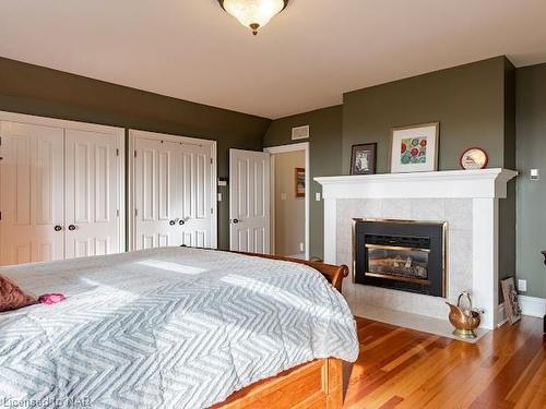 101 Tennessee Avenue, Port Colborne, ON - Indoor Photo Showing Bedroom With Fireplace