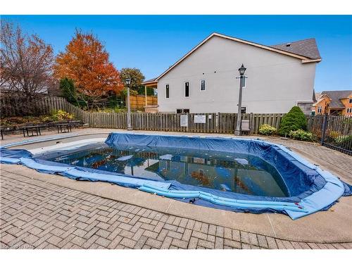 15-2720 Mewburn Road, Niagara Falls, ON - Outdoor With In Ground Pool With Backyard