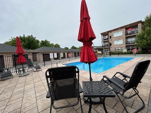 111-4644 Pettit Avenue, Niagara Falls, ON - Outdoor With In Ground Pool