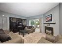 84 Merritt Street, St. Catharines, ON  - Indoor Photo Showing Living Room With Fireplace 