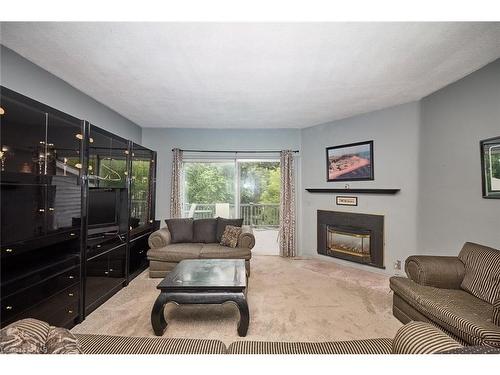 84 Merritt Street, St. Catharines, ON - Indoor Photo Showing Living Room With Fireplace