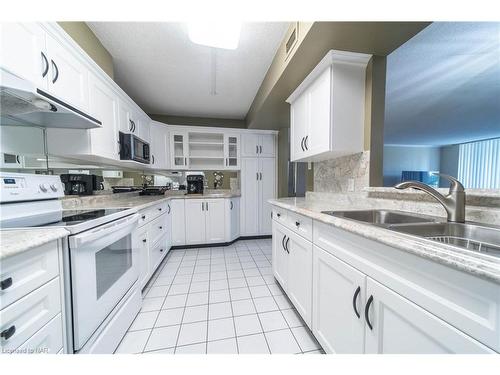 209-8111 Forest Glen Drive, Niagara Falls, ON - Indoor Photo Showing Kitchen With Double Sink