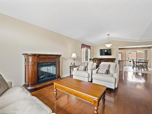 4476 Connell Avenue, Niagara Falls, ON - Indoor Photo Showing Living Room With Fireplace