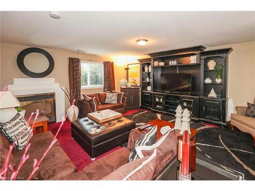 7799 Yvette Crescent, Niagara Falls, ON - Indoor Photo Showing Living Room With Fireplace