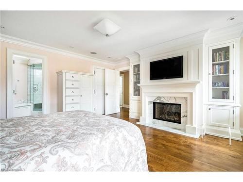 13-11 Bay Street E, Thornbury, ON - Indoor Photo Showing Bedroom With Fireplace