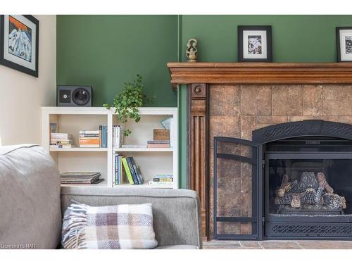 96 South Drive, St. Catharines, ON - Indoor Photo Showing Bedroom With Fireplace