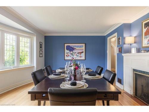 96 South Drive, St. Catharines, ON - Indoor Photo Showing Dining Room With Fireplace